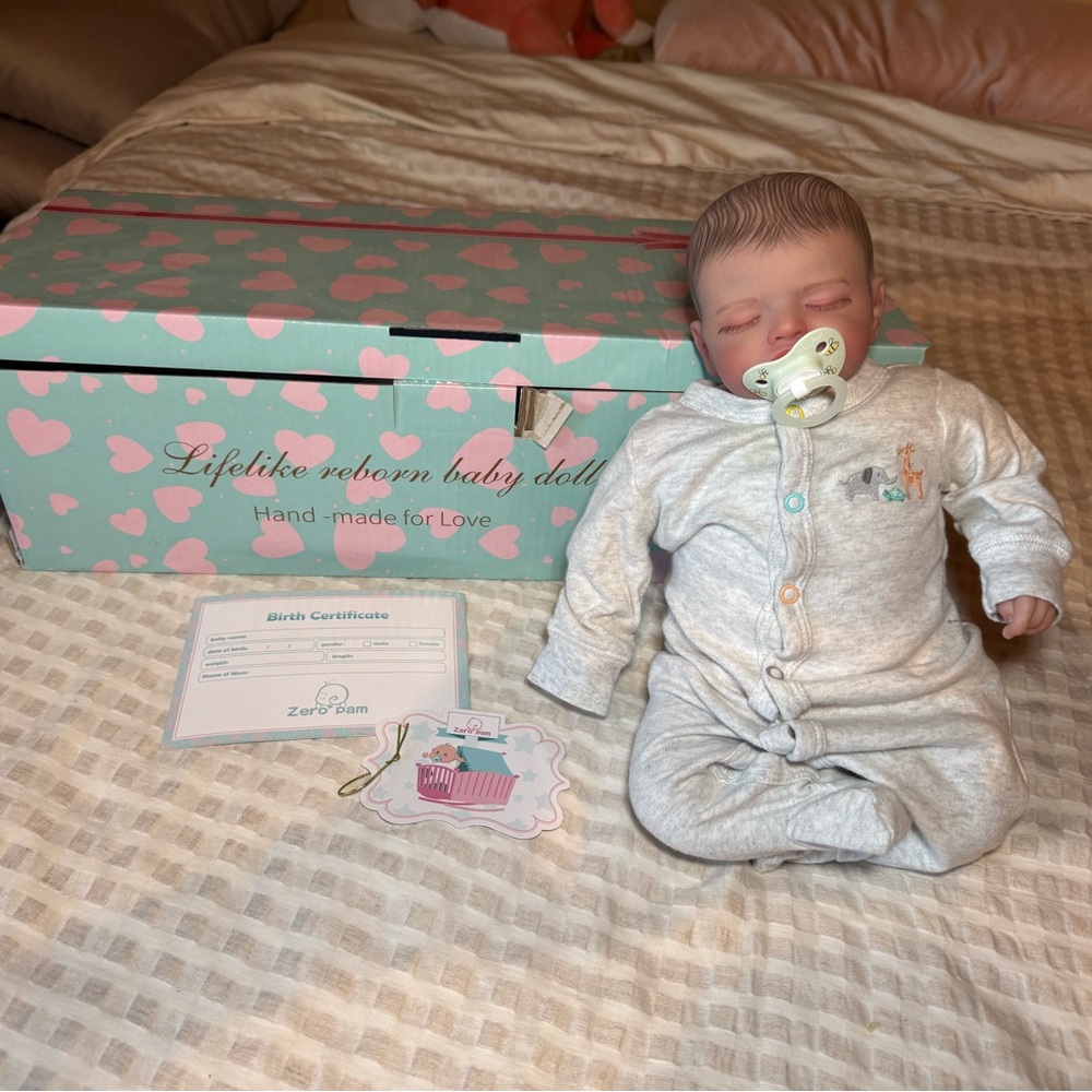 Lifelike Reborn Baby Doll with Gray Outfit
